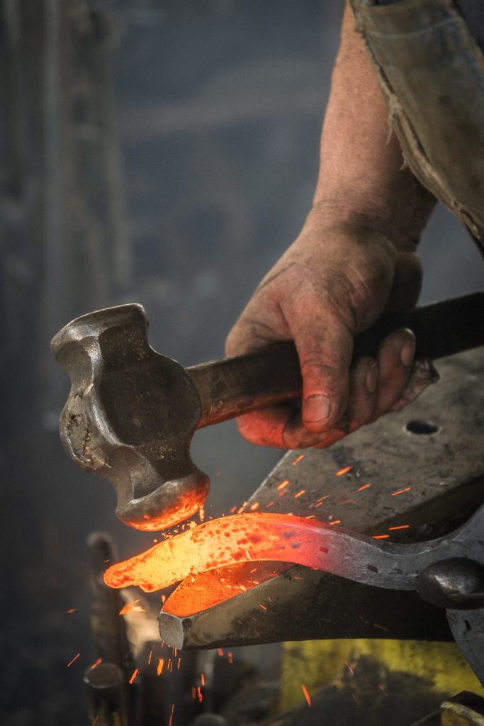pexels-photo-3680094 Man Forging Metal